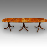 Regency style mahogany 3 pillar dining table