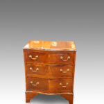 1920's small mahogany serpentine chest