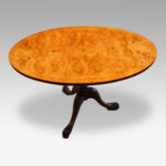 Walnut coffee table of oval shape
