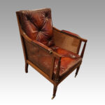 19thc. mahogany bergere library chair