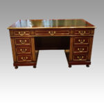 Antique brass mounted mahogany desk