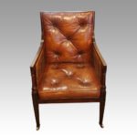 Antique mahogany bergere library chair