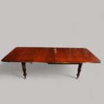 Antique mahogany extending dining table