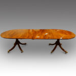 Antique mahogany twin pillar dining table