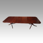 Antique mahogany twin pillar dining table