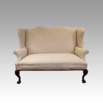 Edwardian mahogany wingback settee