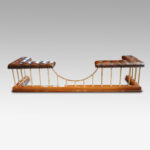 Edwardian oak and brass club fender