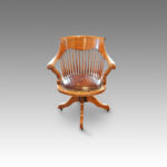 Edwardian oak spindle back revolving desk chair