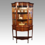 Edwardian inlaid serpentine display cabinet