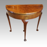 George V walnut demi lune card table 