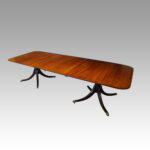 George VI mahogany twin pillar dining table