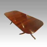 George VI mahogany pedestal dining table