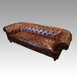 Large buttoned leather chesterfield