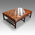 Mahogany and leather coffee table