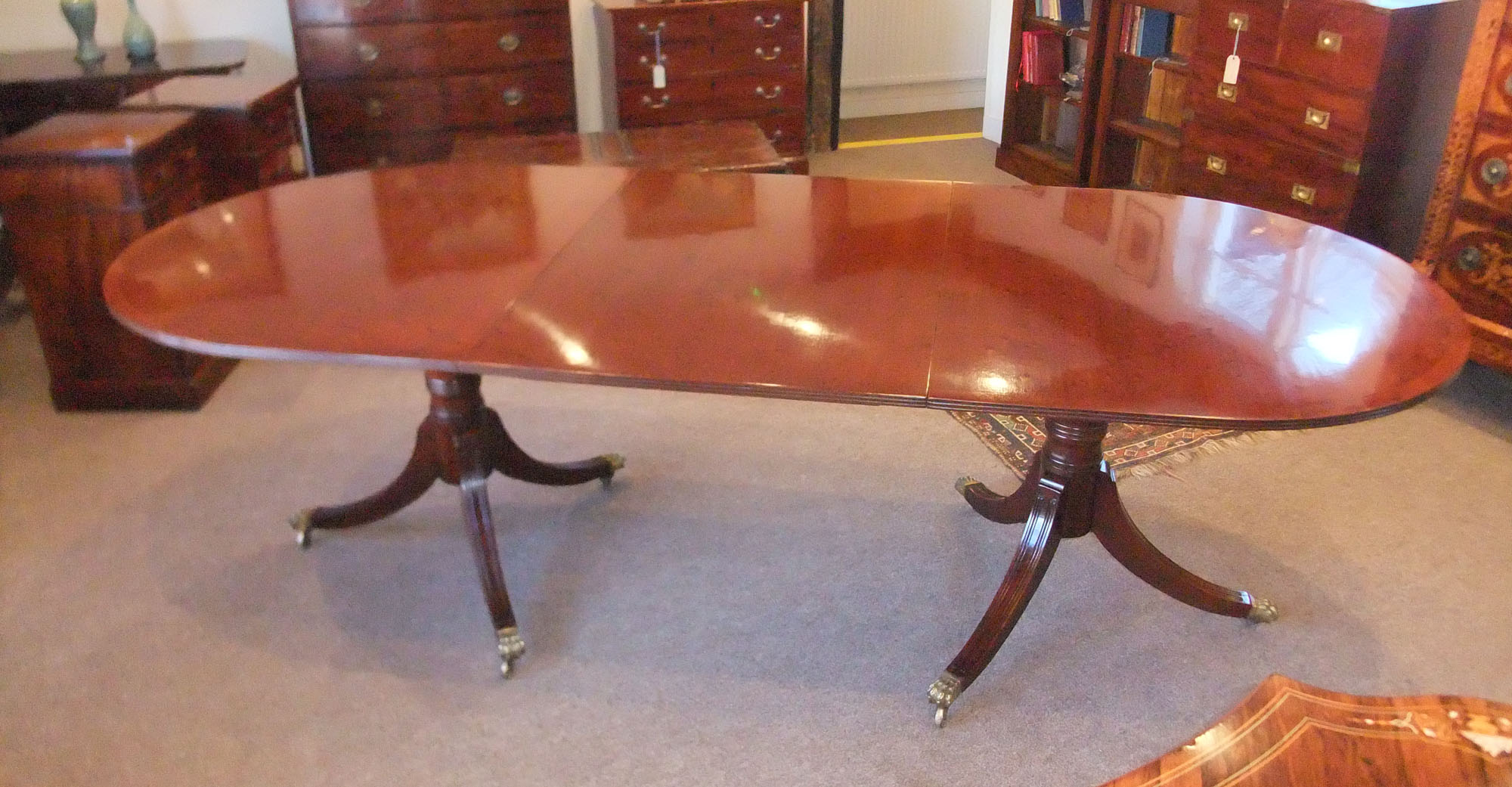 Mahogany-twin-pillar-dining-table-mid-.20th-c.jpg Mahogany 'Plum Pudding' Twin Pillar Dining Table - Image 1