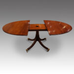 Oval mahogany extending dining table - Image 3