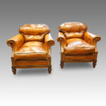Pair of Edwardian club chairs Now Sold