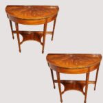 Pair of Edwardian demi lune tables