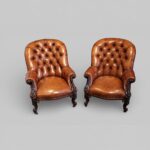 Pair of Victorian Button Back Leather Reading Chairs with Rosewood Arms & Legs