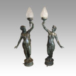 Pair of large bronze lanterns of maidens