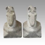 Pair of horsehead column tops