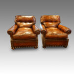 Pair of Edwardian leather club easy chairs