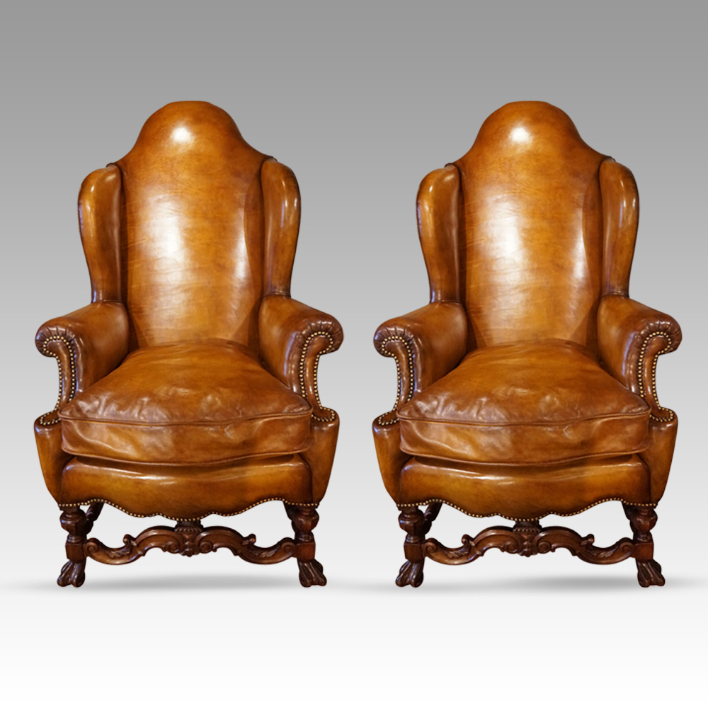 Pair-of-walnut-leather-wing-chairs.jpg Pair of large leather wing back chairs - Image 1