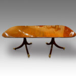 Regency style mahogany dining table,twin pillar