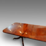 Regency style mahogany cross-banded twin pillar dining table - Image 2