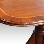 Regency style mahogany cross-banded twin pillar dining table - Image 5