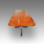 Regency style mahogany cross-banded twin pillar dining table - Image 6