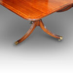 Regency style mahogany cross-banded twin pillar dining table - Image 8