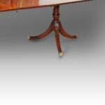Regency style mahogany cross-banded twin pillar dining table - Image 10