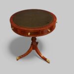 Small George VI mahogany drum table