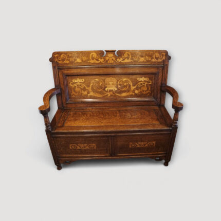 Art Nouveau inlaid oak settle with inlaid floral panels