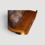 Vintage oak settle with ornate inlaid motifs