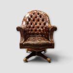 Captains buttoned leather desk chair with brass castors