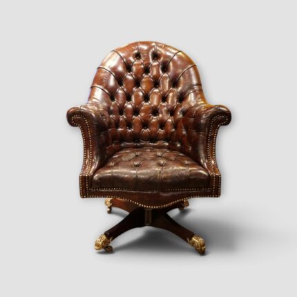 Captains buttoned leather desk chair with brass castors
