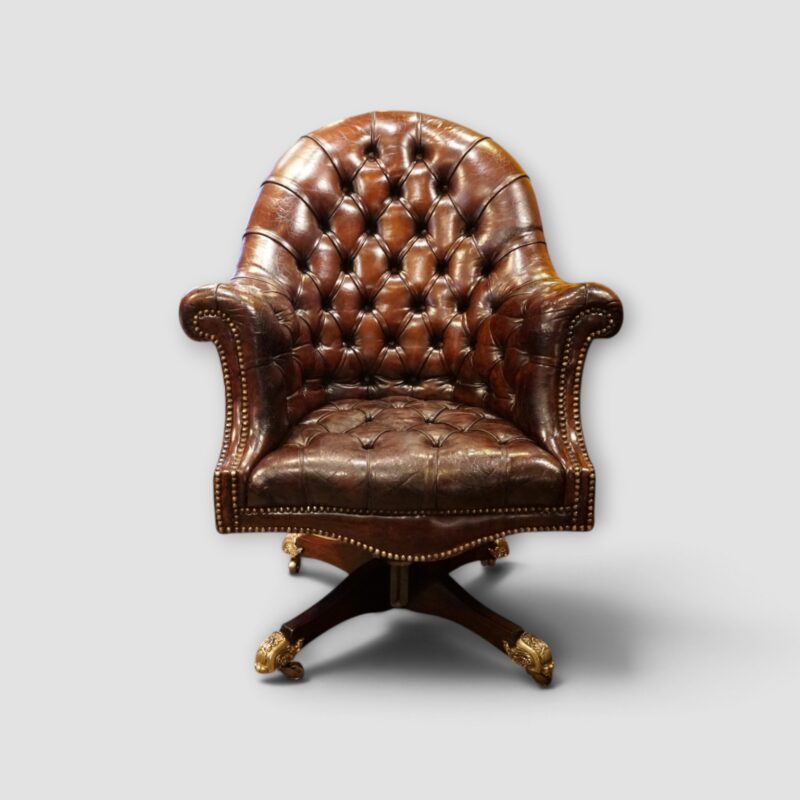 Captains buttoned leather desk chair with brass castors