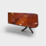 Antique mahogany table with polished surface