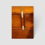 19th‑century campaign chest with rich teak grain