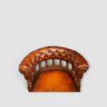 Close‑up of buttoned leather back on Victorian desk chair