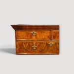 Walnut veneered chest‑on‑chest with brass handles