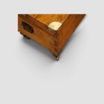 Antique camphor wood trunk with brass fittings used as coffee table
