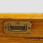 Antique military campaign chest with brass mounts and camphor wood grain