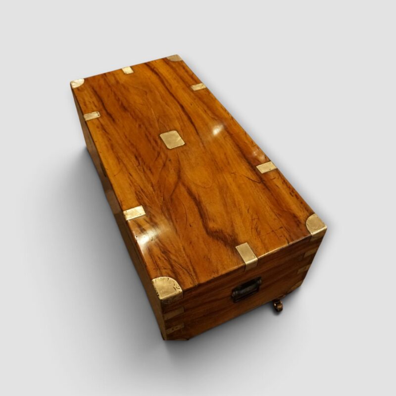 Antique brass bound chest with storage and decorative appeal