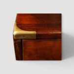 Victorian campaign furniture with brass‑bound corners
