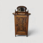 Late Victorian inlaid rosewood music cabinet with decorative mirrored back.