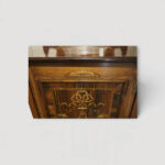 Antique rosewood furniture piece with original mirrored gallery.