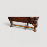 Pair of walnut framed wingback chairs